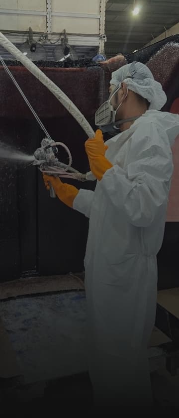 Worker inspecting vacuum formed part